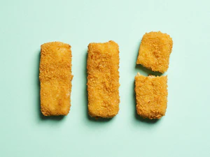 BLUU’s cultivated fish fingers made from trout cells. Copyright Bluu GmbH. Photo: Anna Brauns.